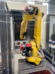 Cellule robotisée de deux centres d'usinage 5 axes MAKINO DA 300